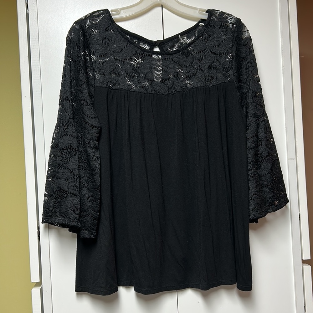 Black lacy 3/4 sleeve top .  Comfy & pretty